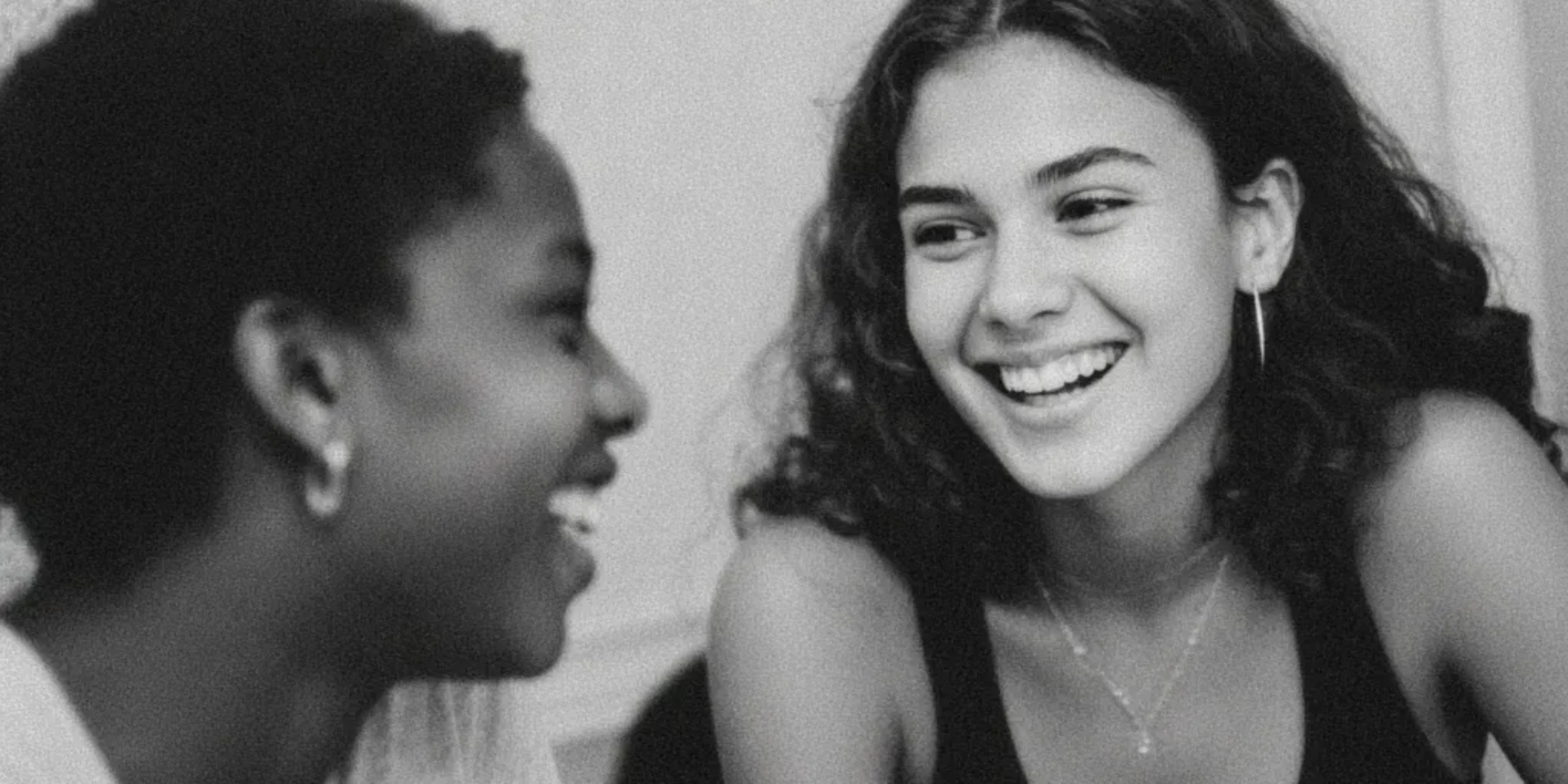 Black and white photography of white and black teenage girls in luxury rehab