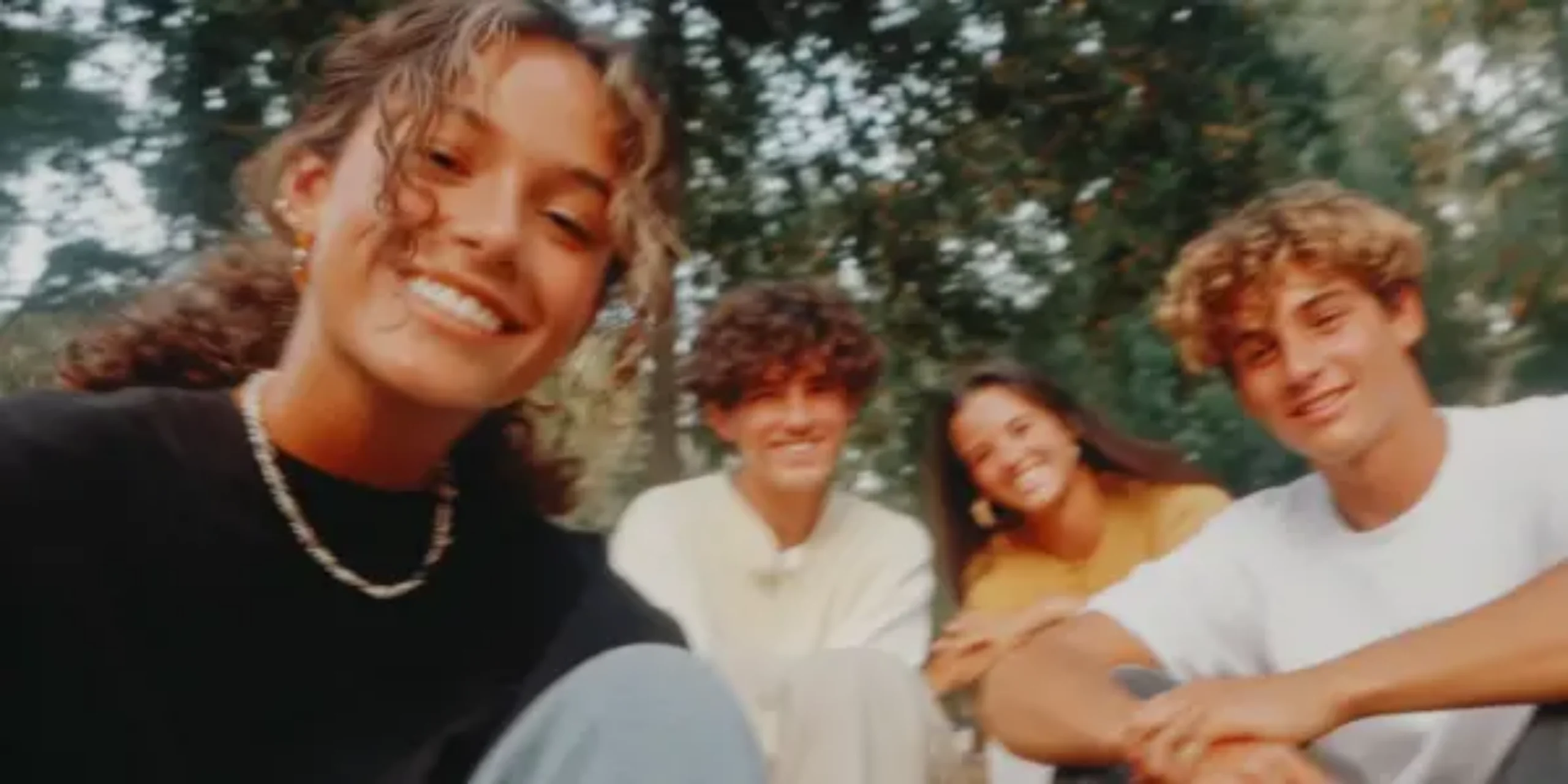 Friends taking selfie outdoors