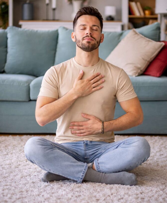 Man with eyes closed focusing on breathing