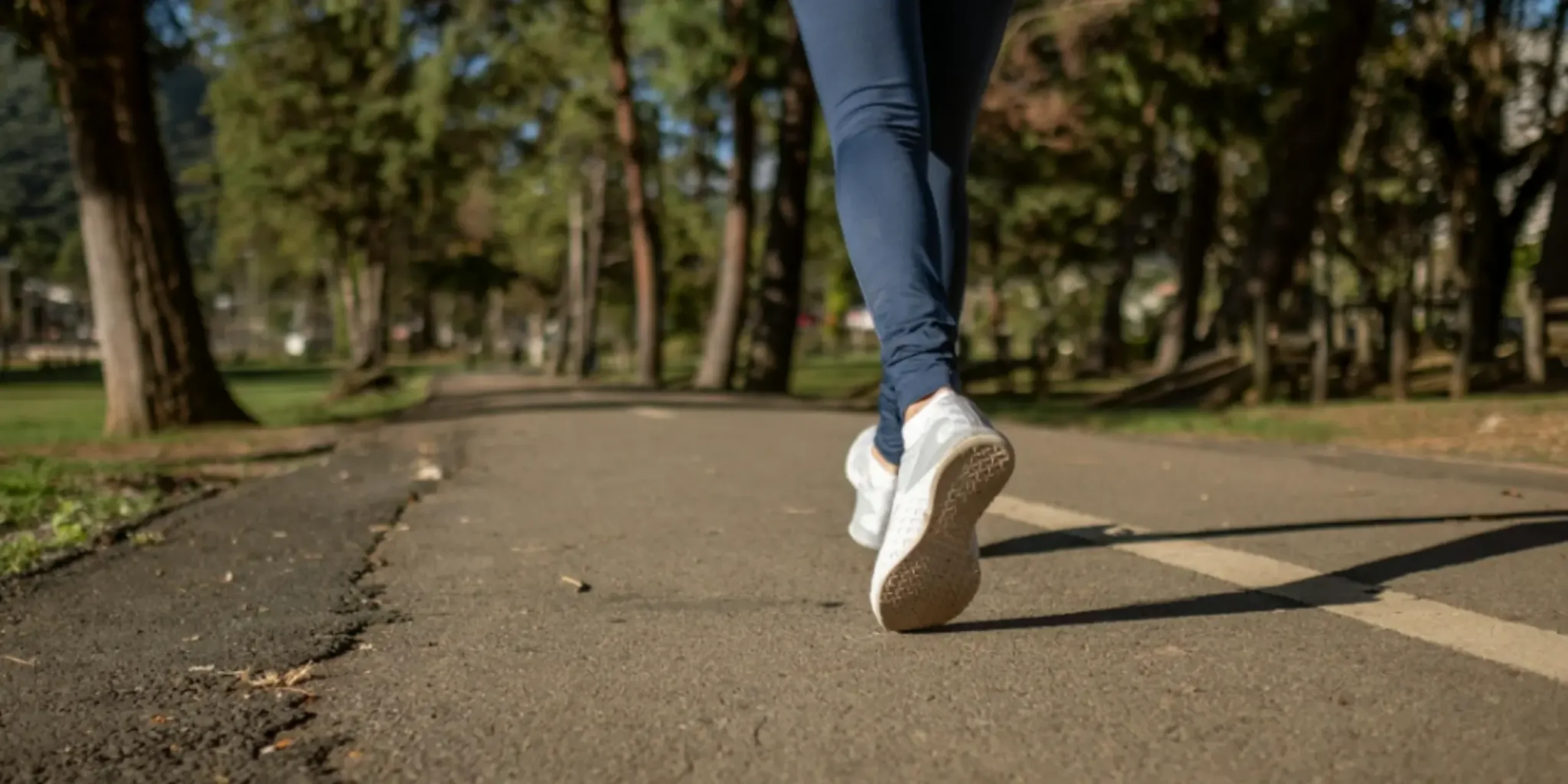 Person walking outdoors for exercise