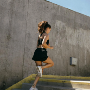 Woman running outdoors for fitness